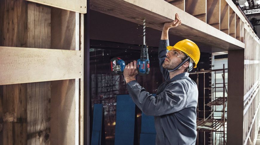 Bosch Набір із двох акумуляторних інструментів 18В шліфувальна машина кутова GWS180-LI дриль-шуруповерт GSB 18V-50 RC_0.615.990.M8S фото