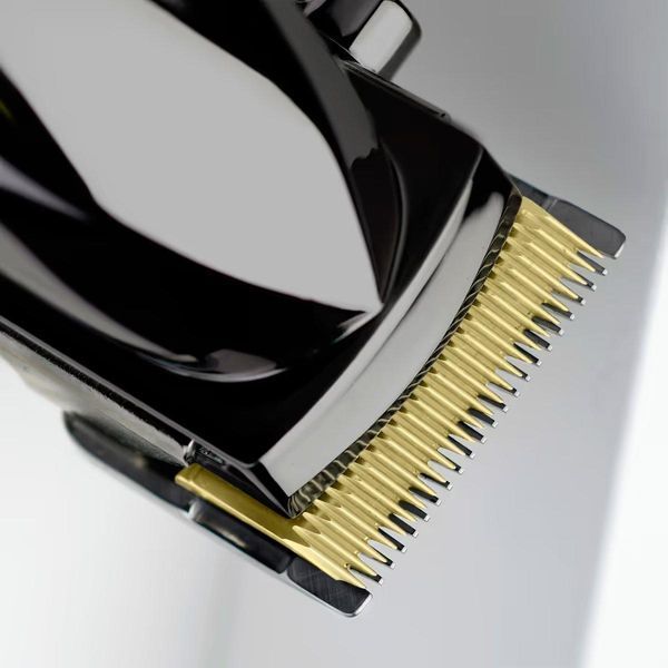 BaByliss Машинка для стрижки Super-X Metal Series, акум., насадок-12, швидка заряд, сумка для зберігання, сталь. RC_E991E фото