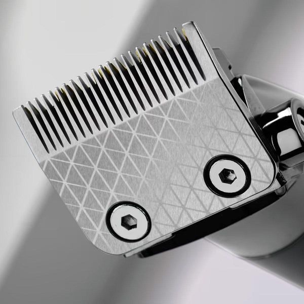 BaByliss Машинка для стрижки Super-X Metal Series, акум., насадок-12, швидка заряд, сумка для зберігання, сталь. RC_E991E фото