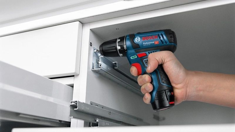 Bosch Шуруповерт-дриль акумуляторний Professional GSR 12V-15, 12В 2х2А/год, 15-30 Нм, 0-400/400-1300 об/хв, RC_0.601.868.10G фото