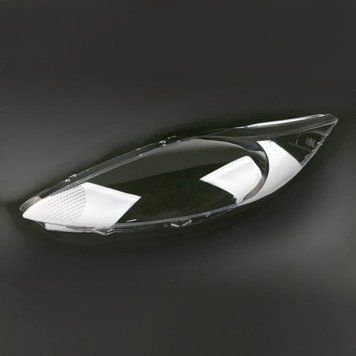 Пластиковое стекло фары Ford Fiesta (MK7) 2008-2012 левое (водительское) KL_2914 фото
